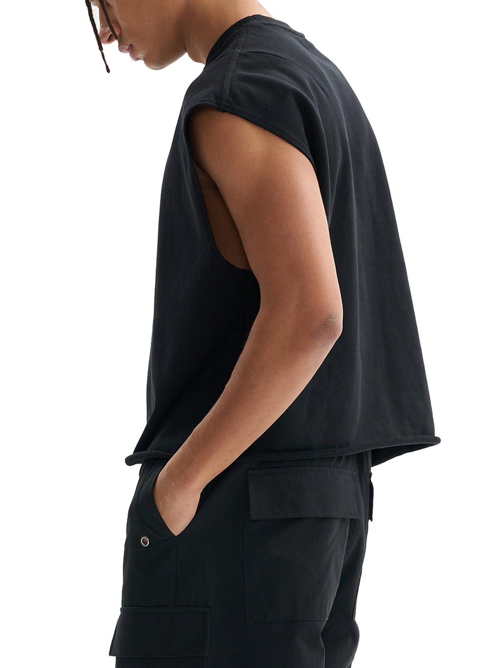 Black French terry boxy tank top worn by male model with hands in pockets