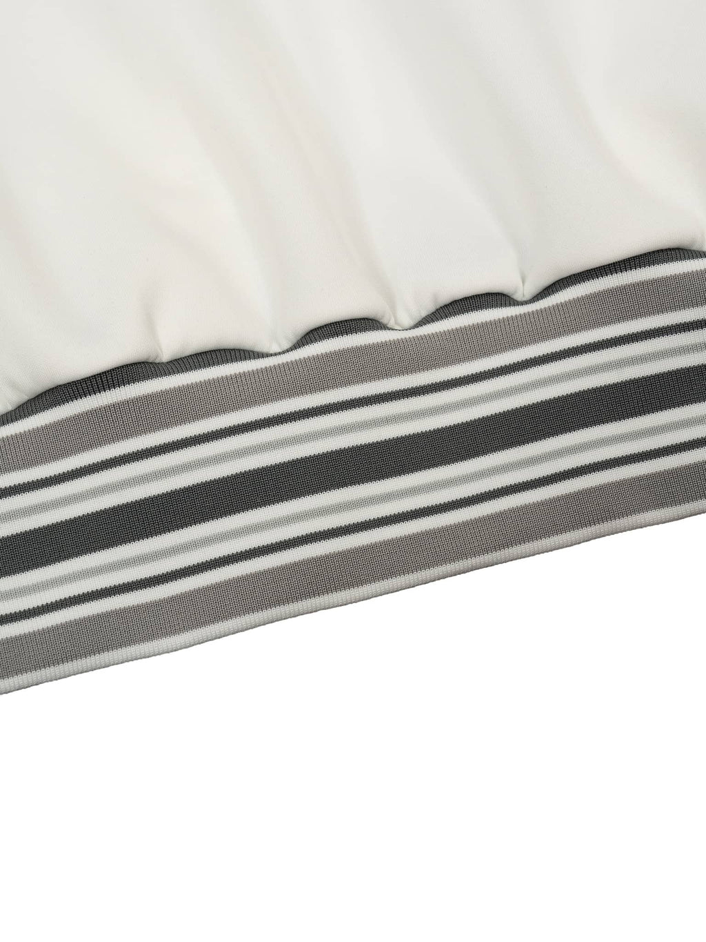 Close-up of striped rib collar zip jacket hem in gray white and black by FETISHISTO