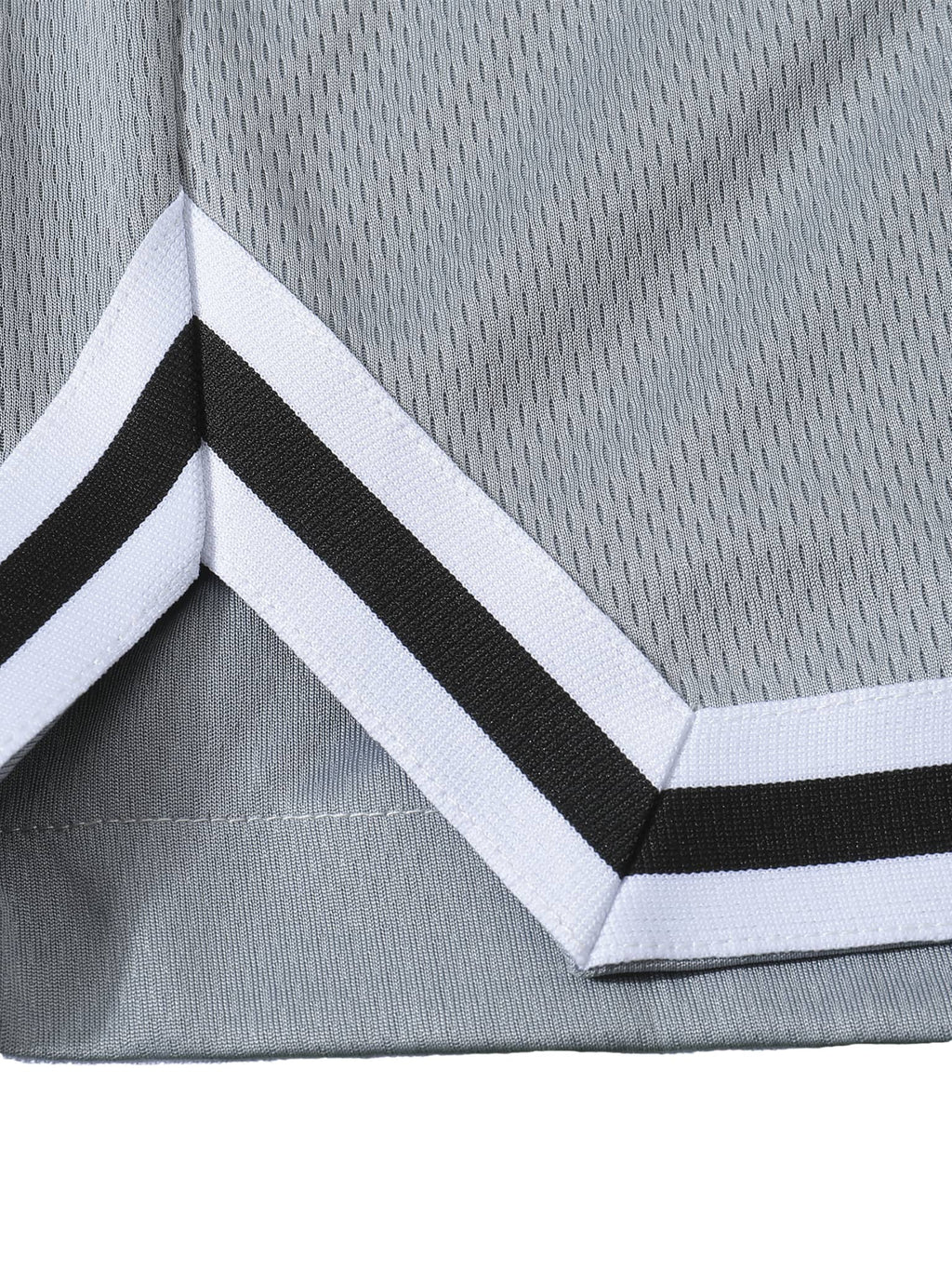 Close-up view of FETISHISTO classic basketball shorts in gray with white and black trim detailing