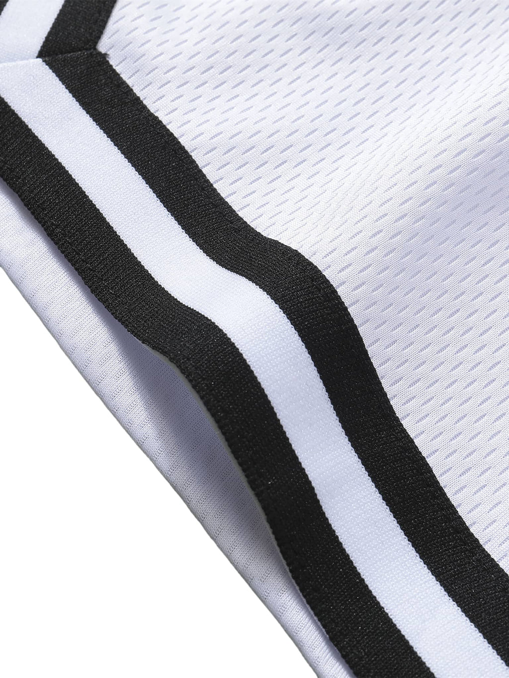 Close-up of FETISHISTO classic basketball shorts white fabric with black and white striped trim