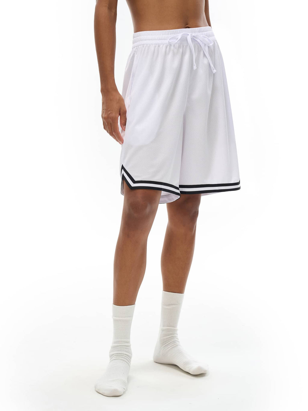 FETISHISTO classic basketball shorts in white with black trim worn by male model