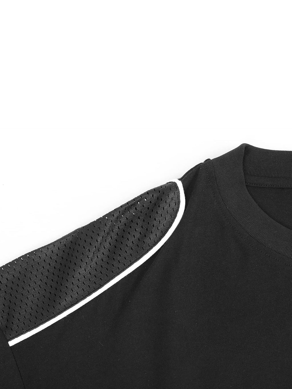 Close-up of black contrast piped fetish t-shirt shoulder with white piping and perforated detail