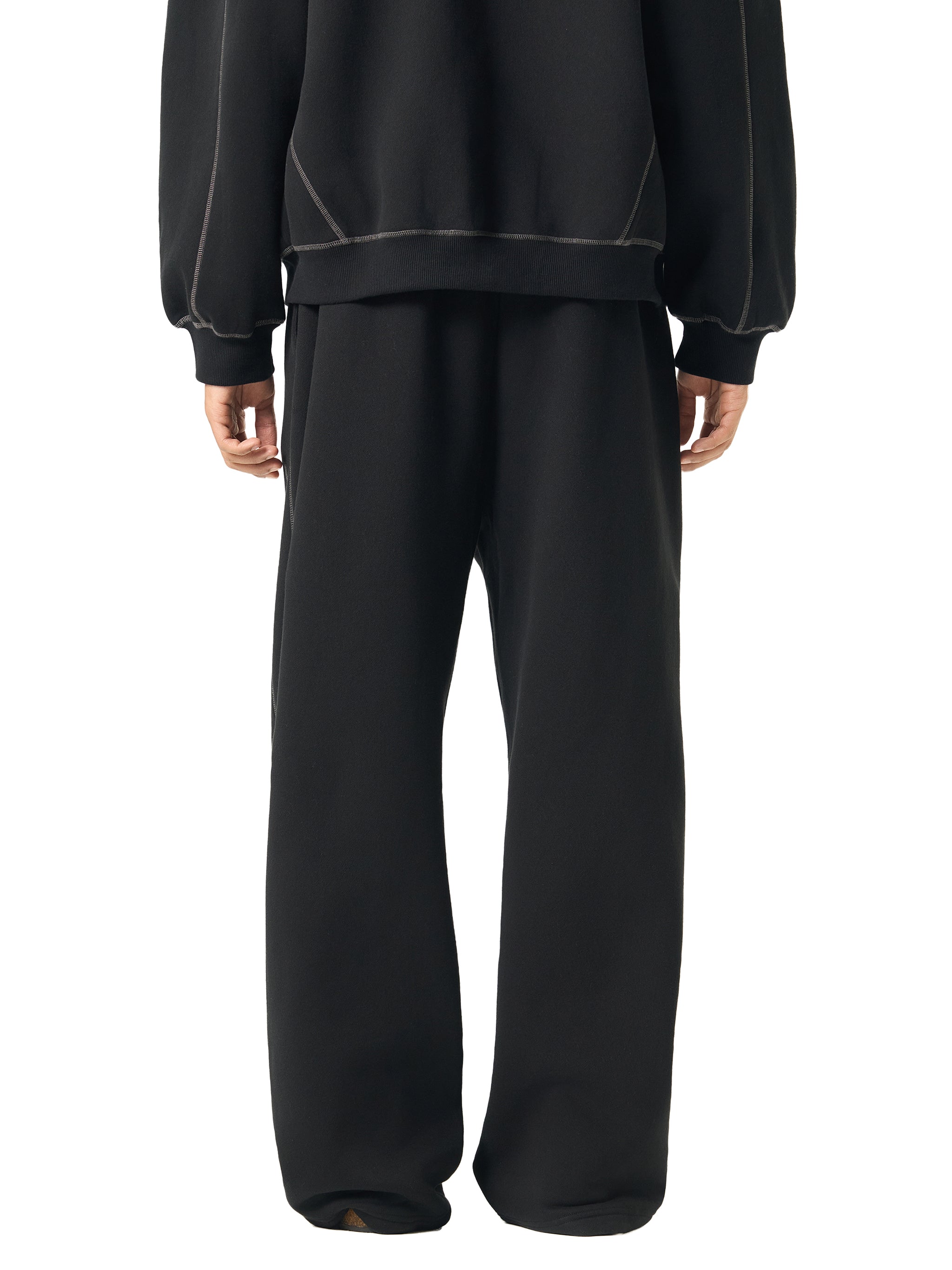 FETISHISTO black contrast stitch fleece sweatpants with relaxed fit and visible stitching details