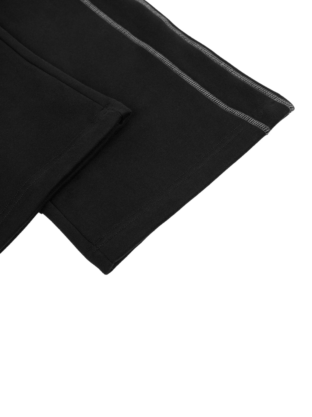 Black contrast stitch fleece sweatpants with detailed white stitching on the hem from FETISHISTO