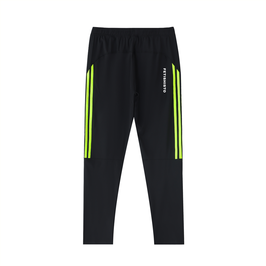 Black fetish running pants by FETISHISTO with neon yellow side stripes and elastic waistband