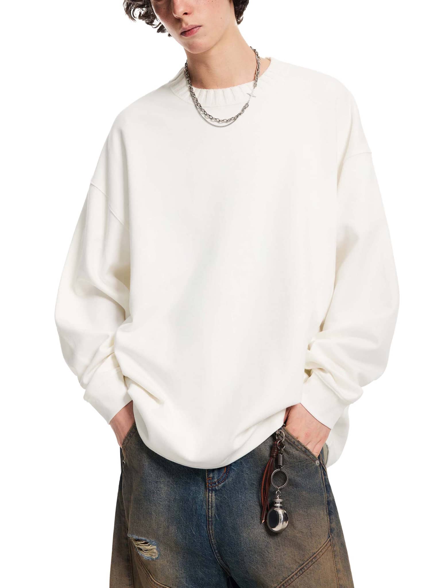 FETISHISTO white oversize knitted round neck sweatshirt worn by model with casual jeans