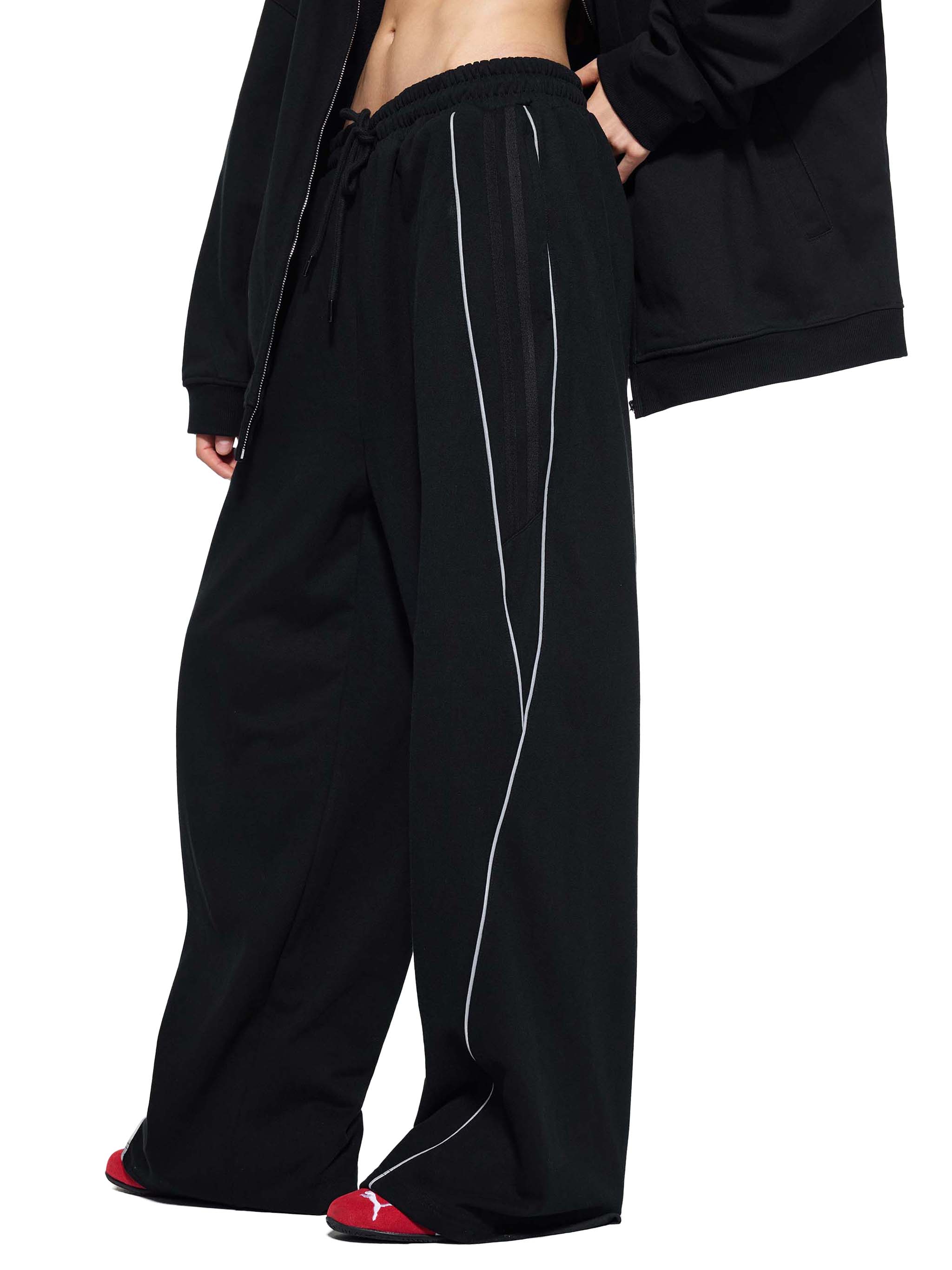 FETISHISTO black reflection striped sweatpants with wide leg and reflective side stripes