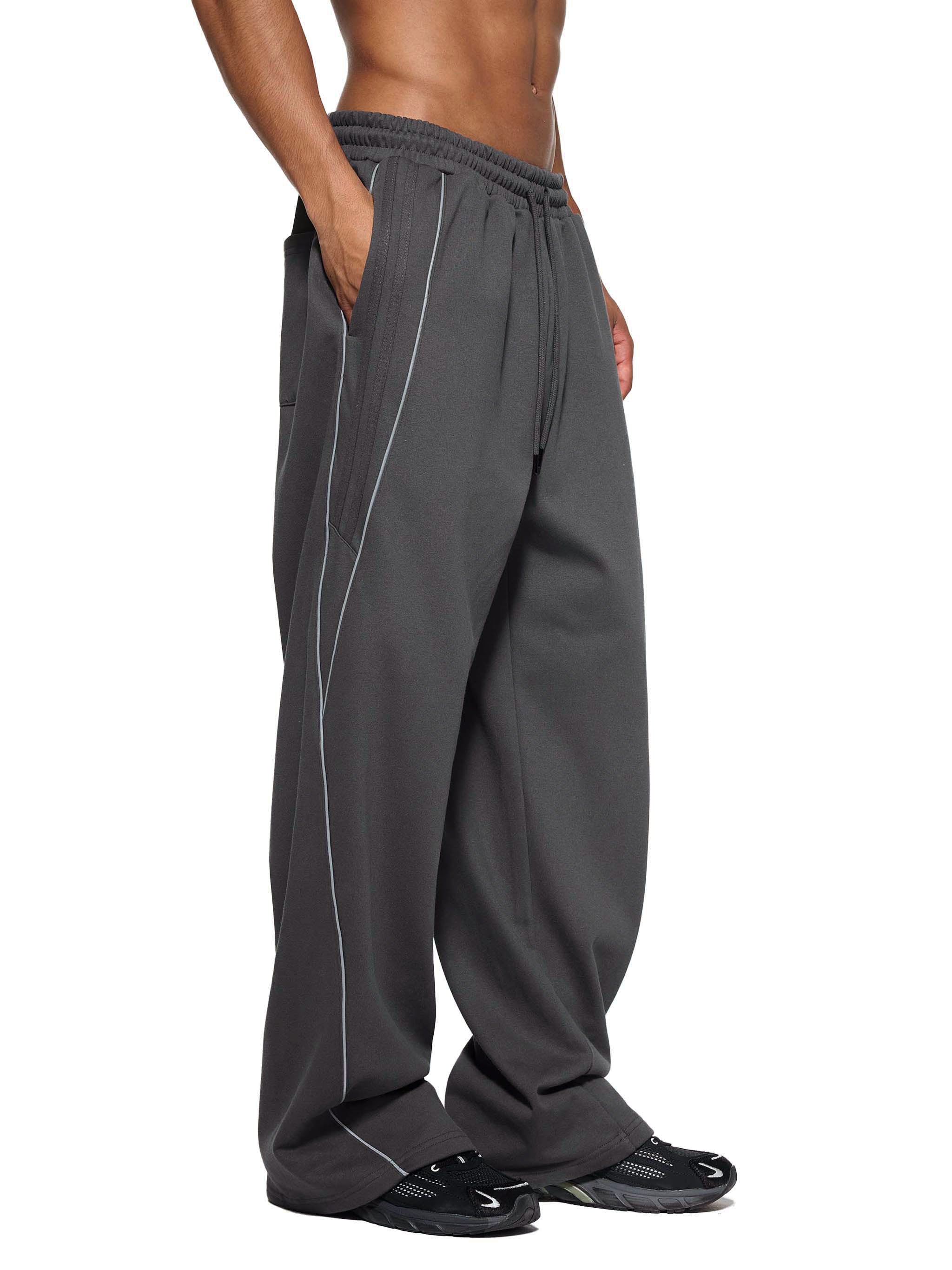 FETISHISTO reflection striped sweatpants in dark gray with side pockets and drawstring waist