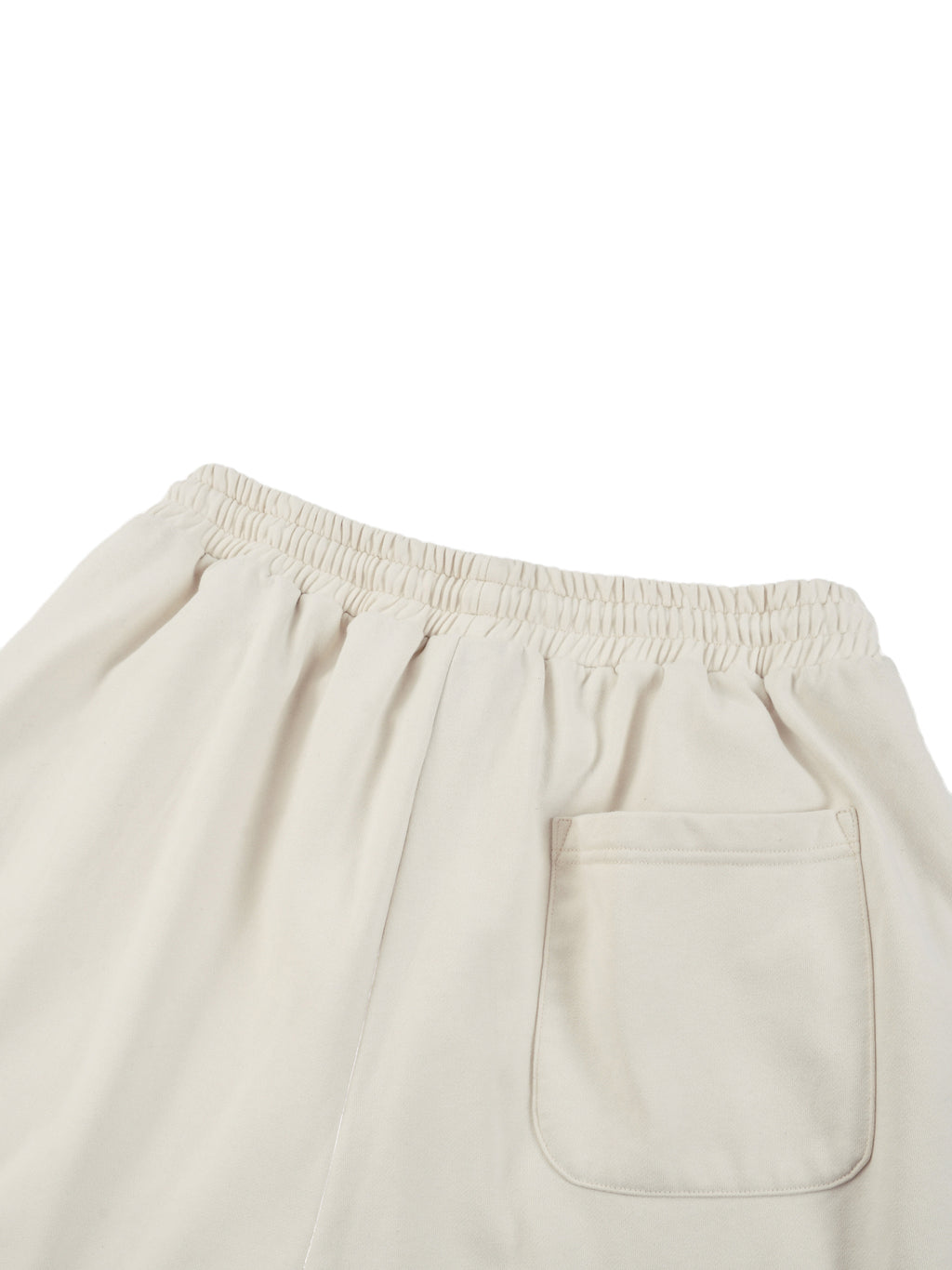 Close-up of cream-colored reflection striped sweatpants with elastic waistband and back pocket by FETISHISTO