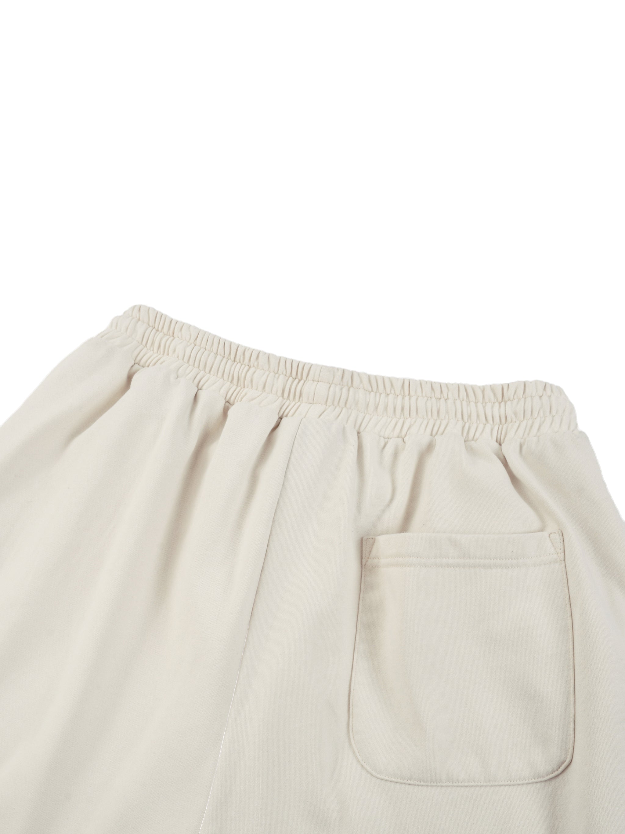 Close-up of cream-colored reflection striped sweatpants with elastic waistband and back pocket by FETISHISTO
