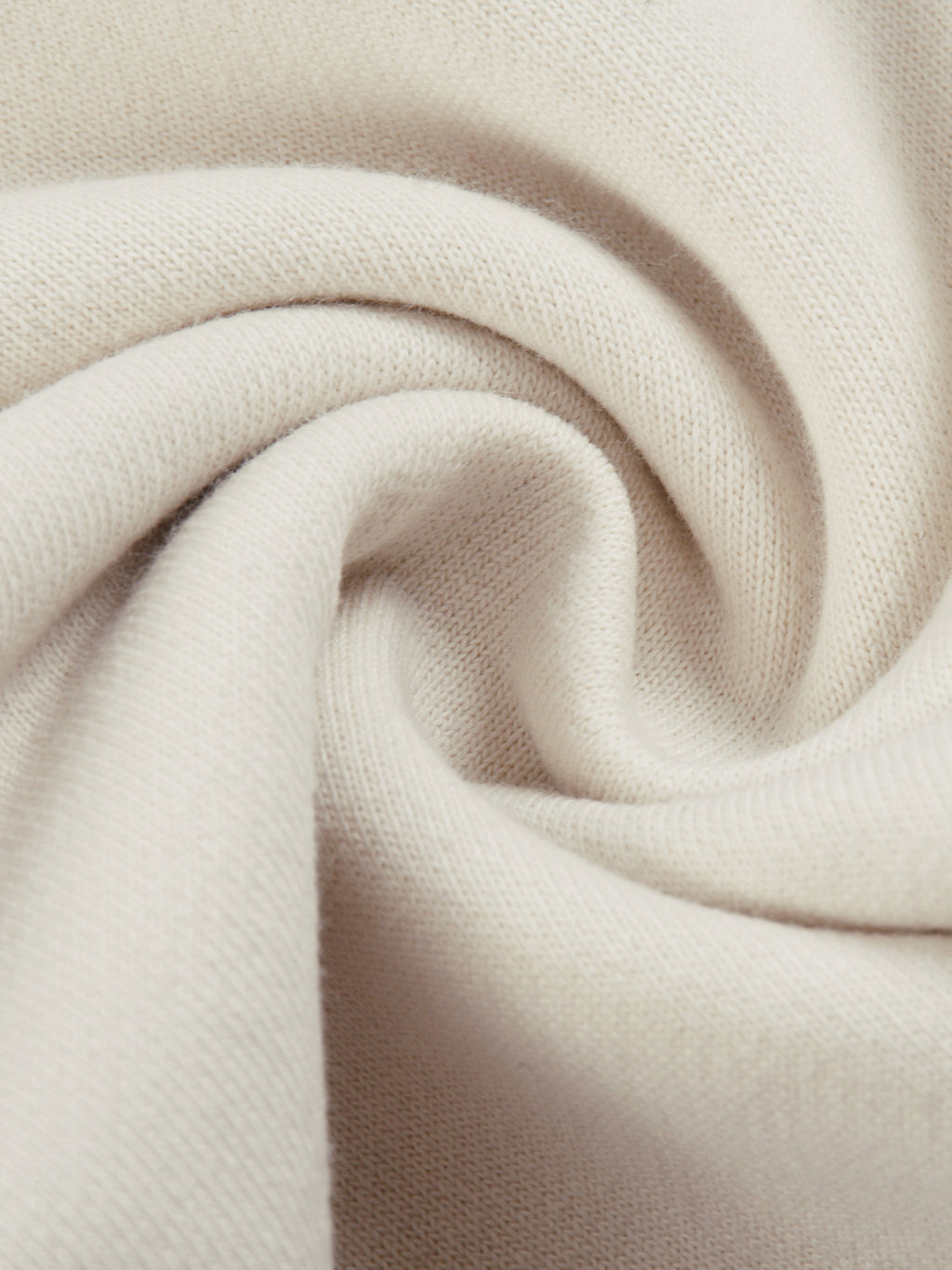 Close-up of soft beige fabric texture for FETISHISTO reflection striped sweatpants