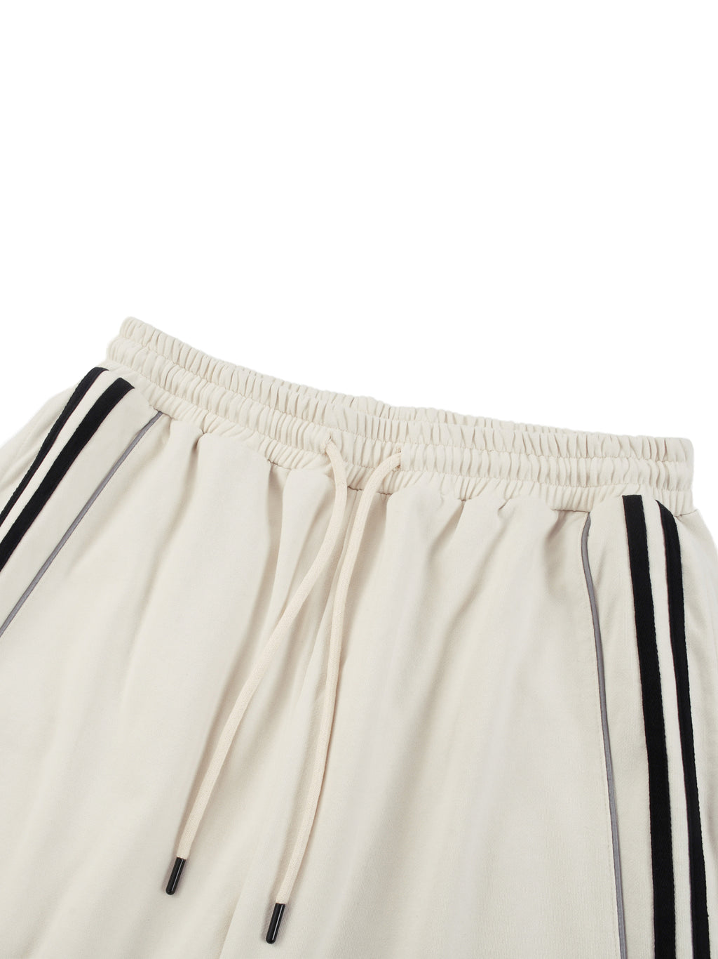 FETISHISTO cream reflection striped sweatpants with elastic waistband and black side stripes