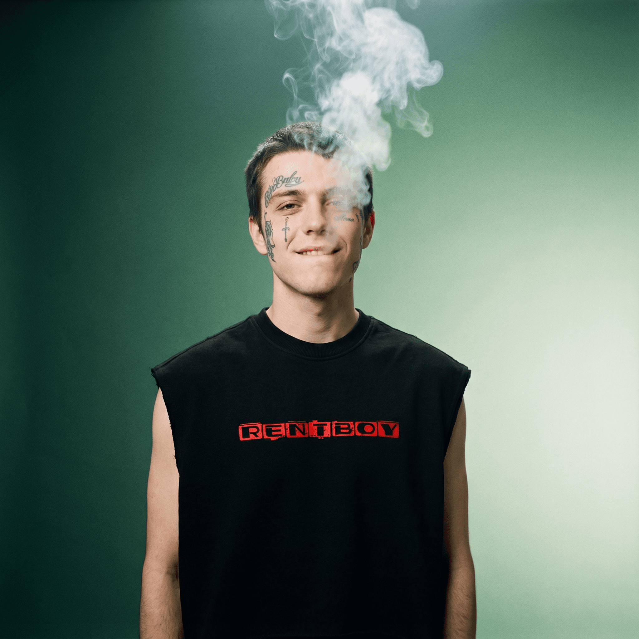 Black french terry boxy tank top with red rentboy logo worn by tattooed man with smoke