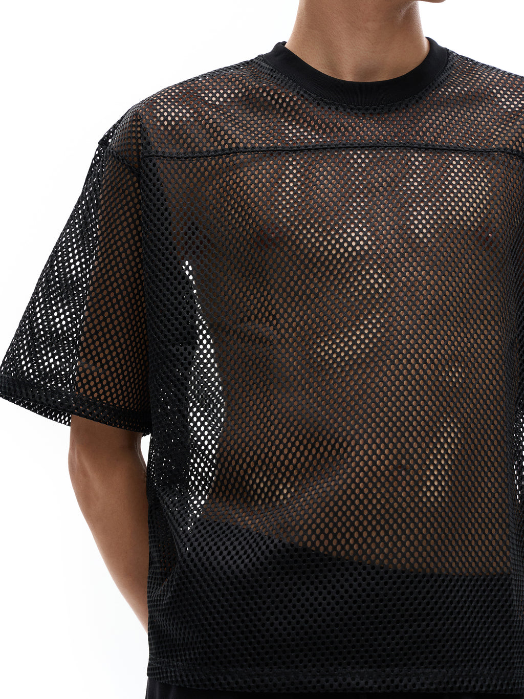 ODMPOD black see-through mesh t-shirt with short sleeves and crew neck on male model