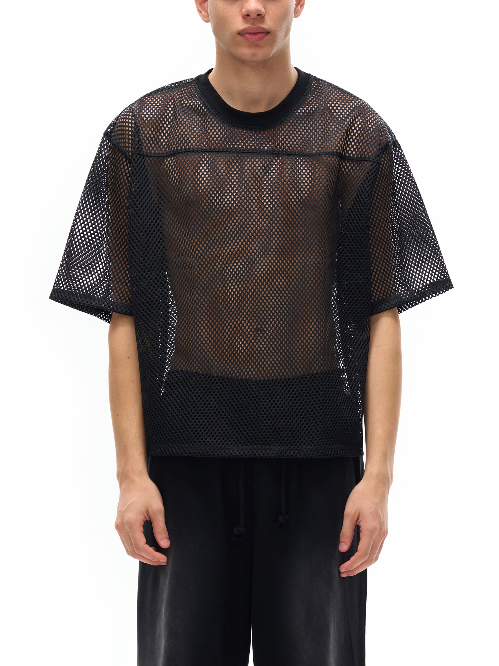 ODMPOD black see-through mesh t-shirt with short sleeves worn by male model