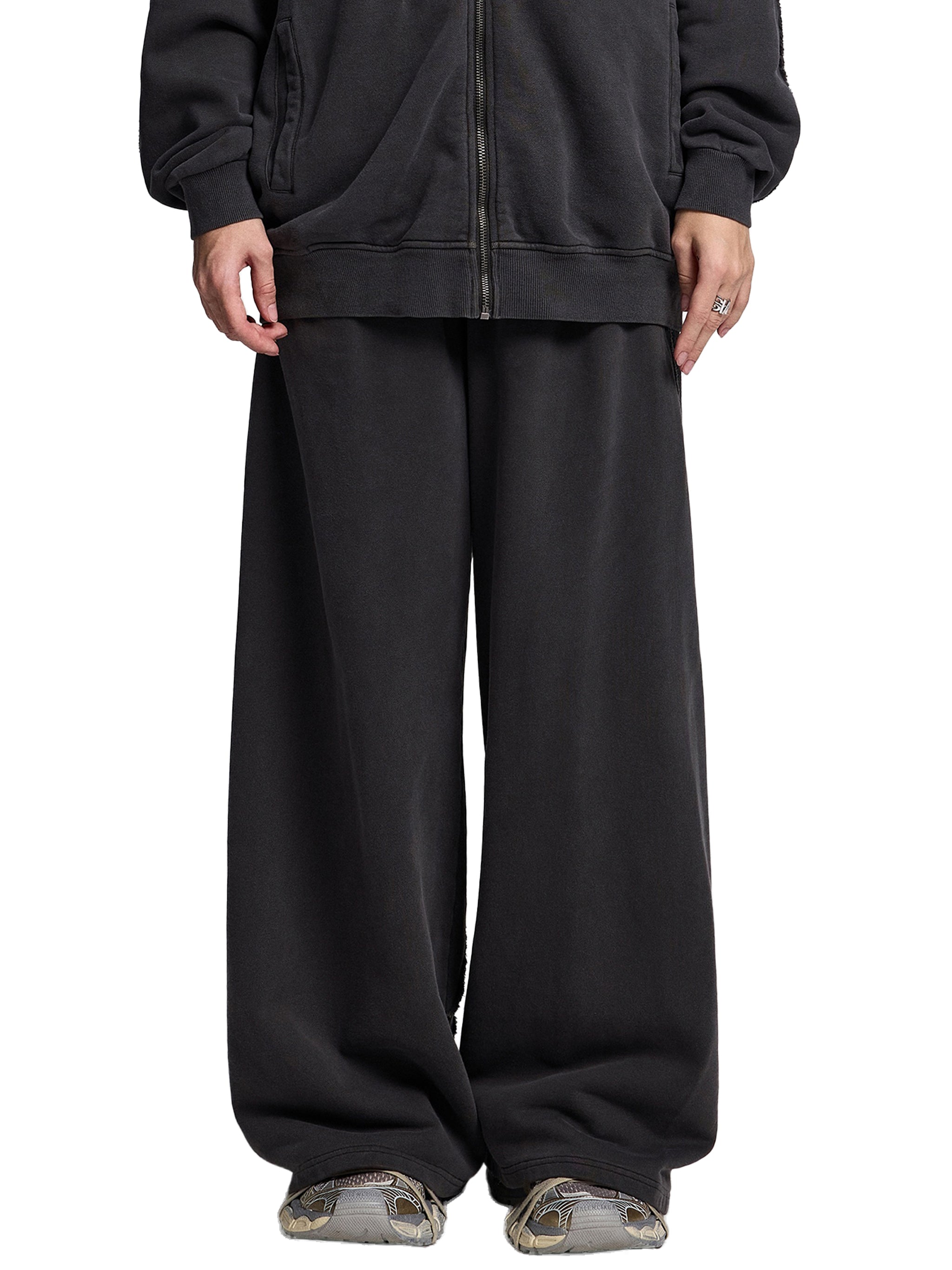 FETISHISTO black snow washed sweatpants for men in relaxed fit with wide legs and casual style