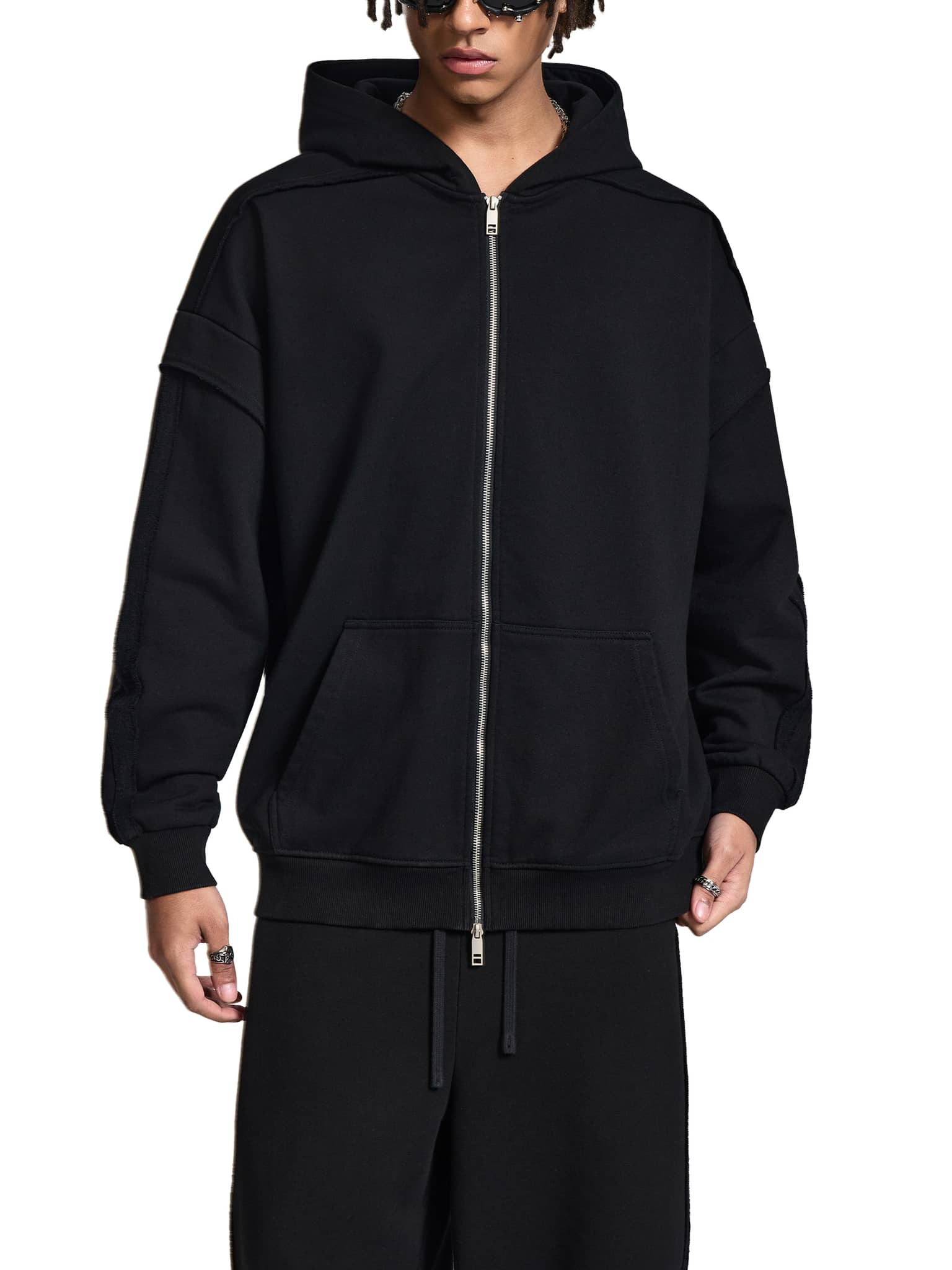 Black fetish style zip hoodie by ODMPOD with front pockets and full zipper closure